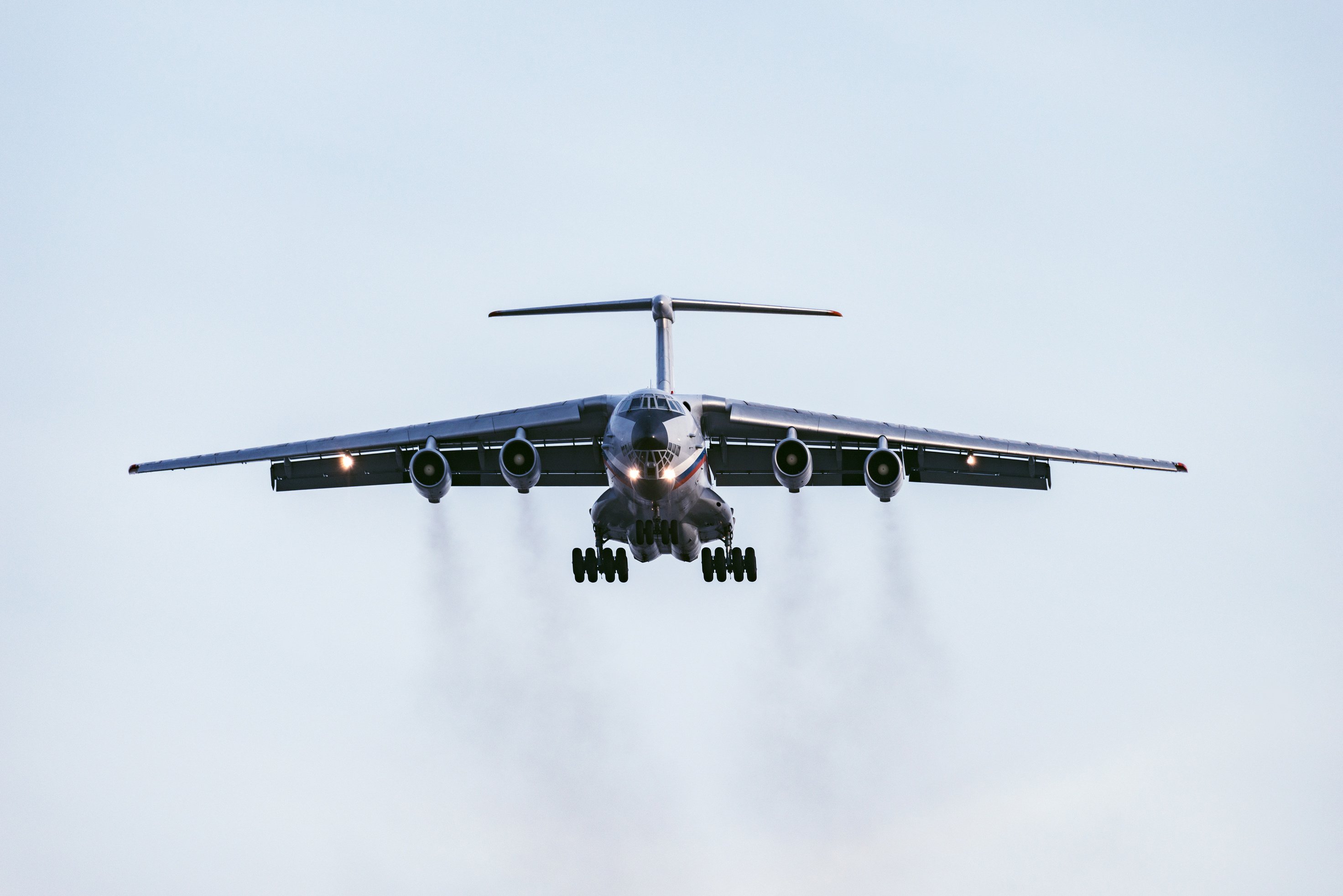 Freight plane in the clear sky.